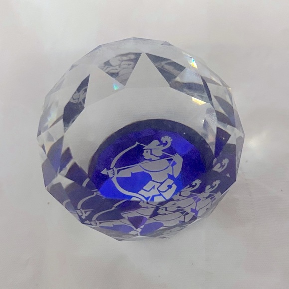 Swarovski Crystal with man & arrow inside blue & white in color. - Picture 1 of 6